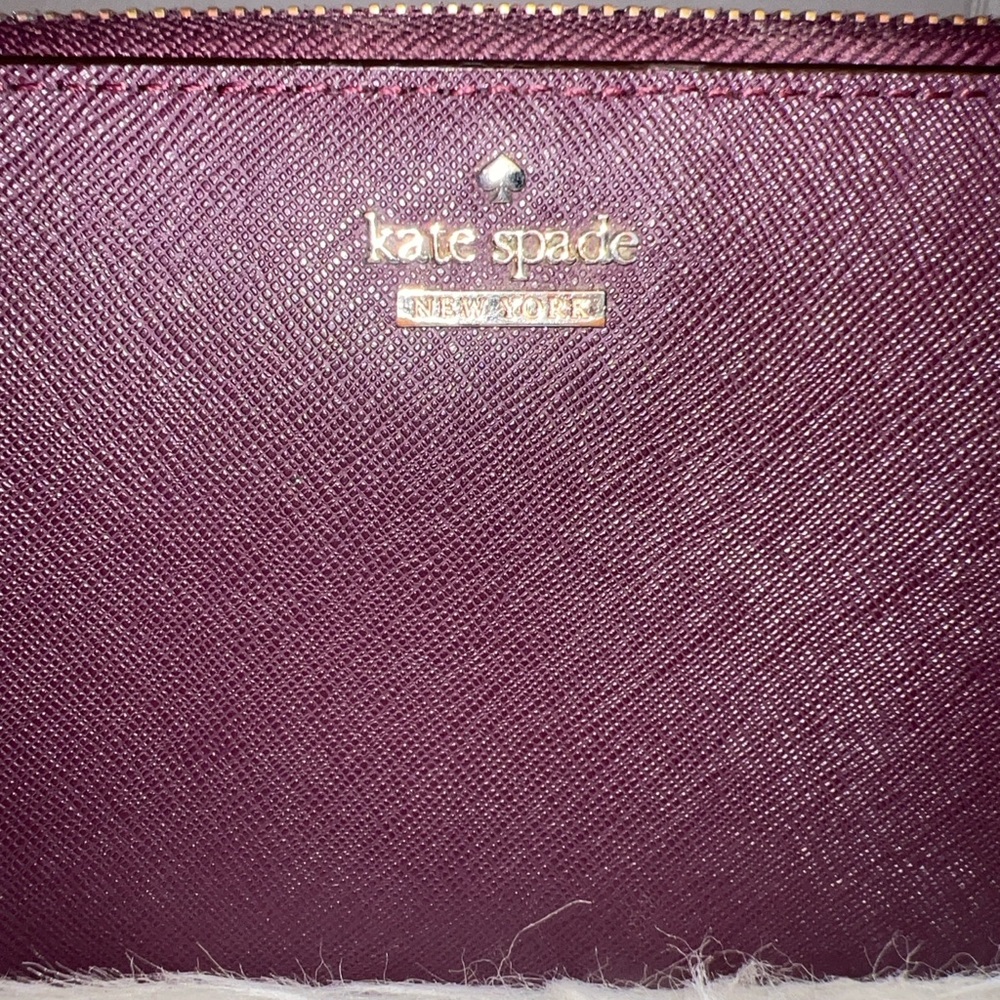 kate spade Zip Wallet in Plum with Gold Logo